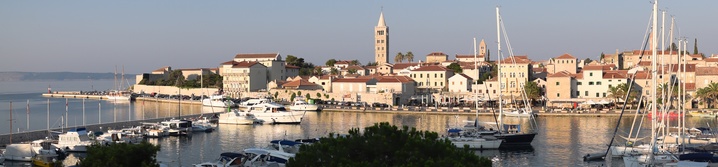 RAB, CROATIA - CIRCA AUGUST 2015: View of the town of Rab, Croatian tourist resort on the homonymous island.
